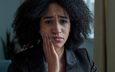 Why Does My Tooth Hurt When I Bite Down? 7 Possible Causes